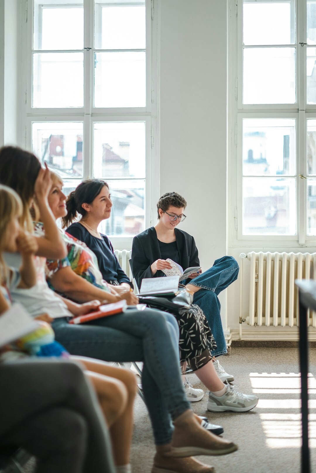 woman leading community meeting