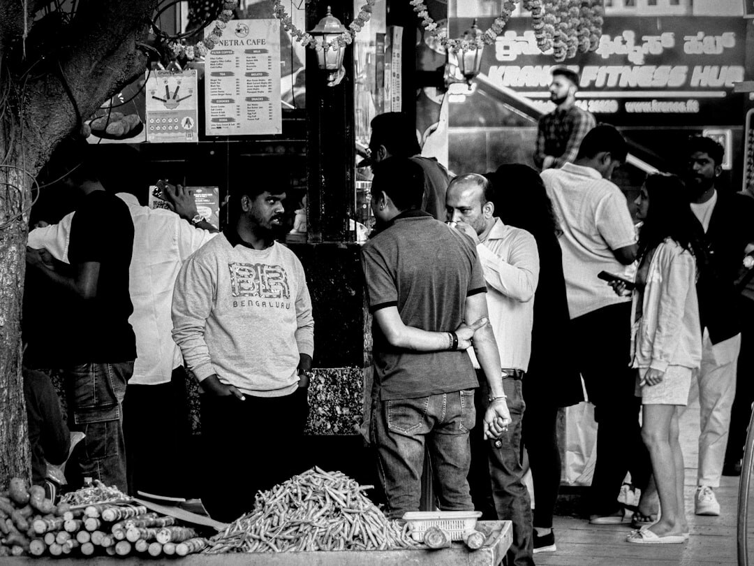 people chatting at local market