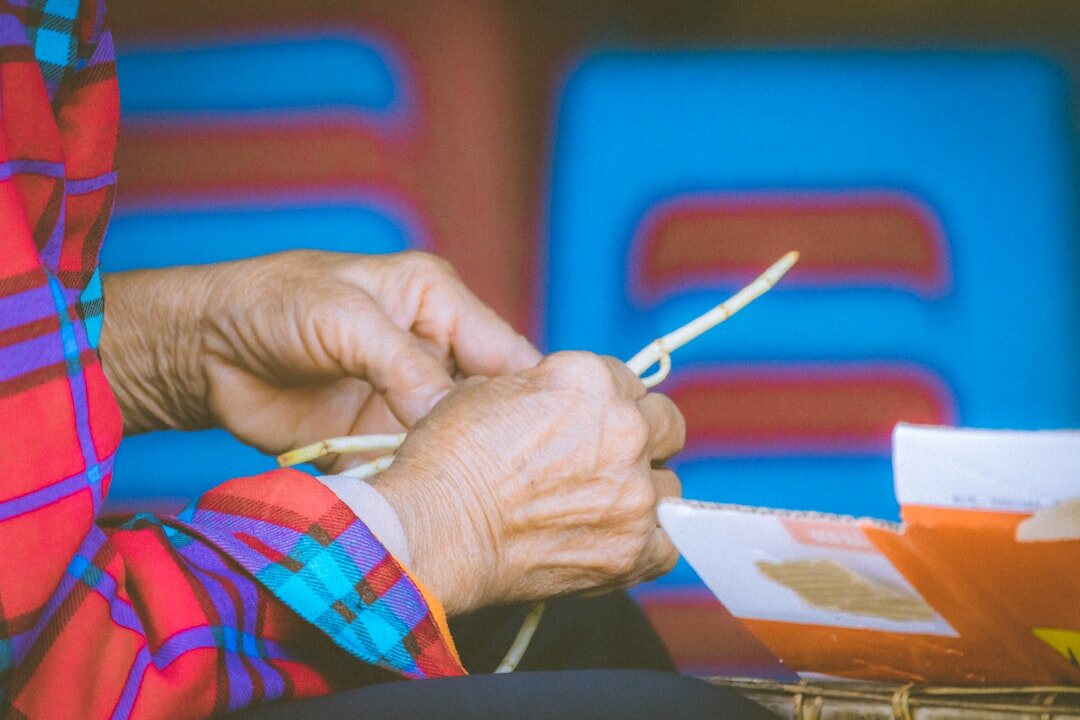 elderly person looking at old photos